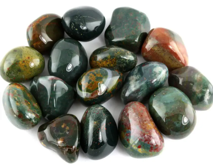 Polished Bloodstone crystal known for boosting physical strength and cleansing the blood.