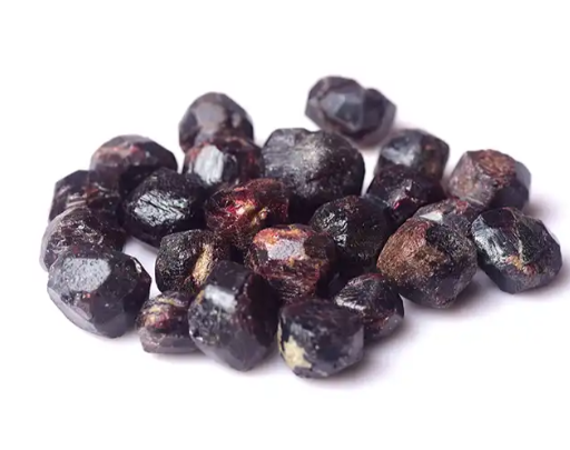 Tumbled Garnet stones symbolizing passion, commitment, and deep connection