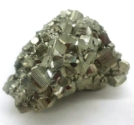 Raw Pyrite cluster known for its strong association with abundance and wealth attraction