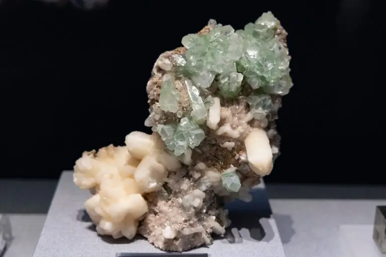 Green Apophyllite crystal cluster showing prismatic tetragonal formation on matrix