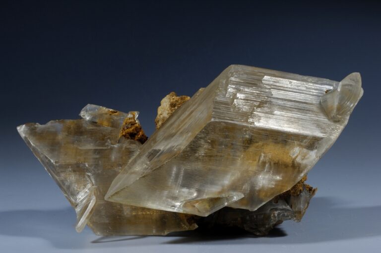 Monoclinic crystal structure – Large Selenite crystal (a variety of Gypsum) from the Cave of Swords, Naica, Chihuahua, Mexico. Shows typical leaning blade shape of the monoclinic system.
